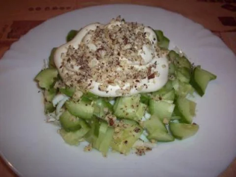 Salad with fresh cucumbers and walnuts