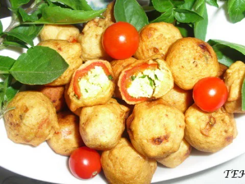 Stuffed tomatoes in batter