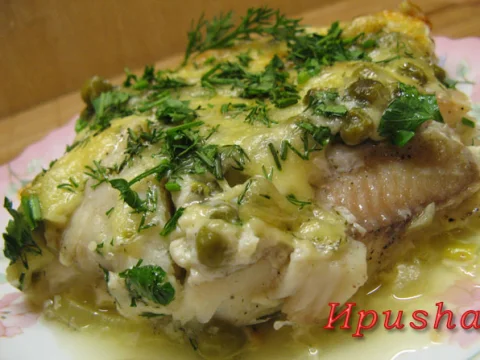 Tilapia (pangasius) with green peas in omelet